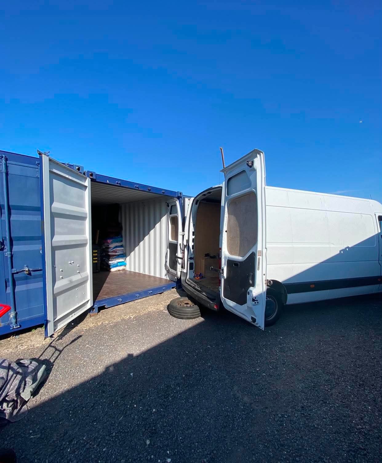 Removal van loading into a secure storage container in East Sussex